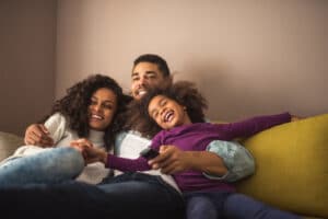 Happy family on couch