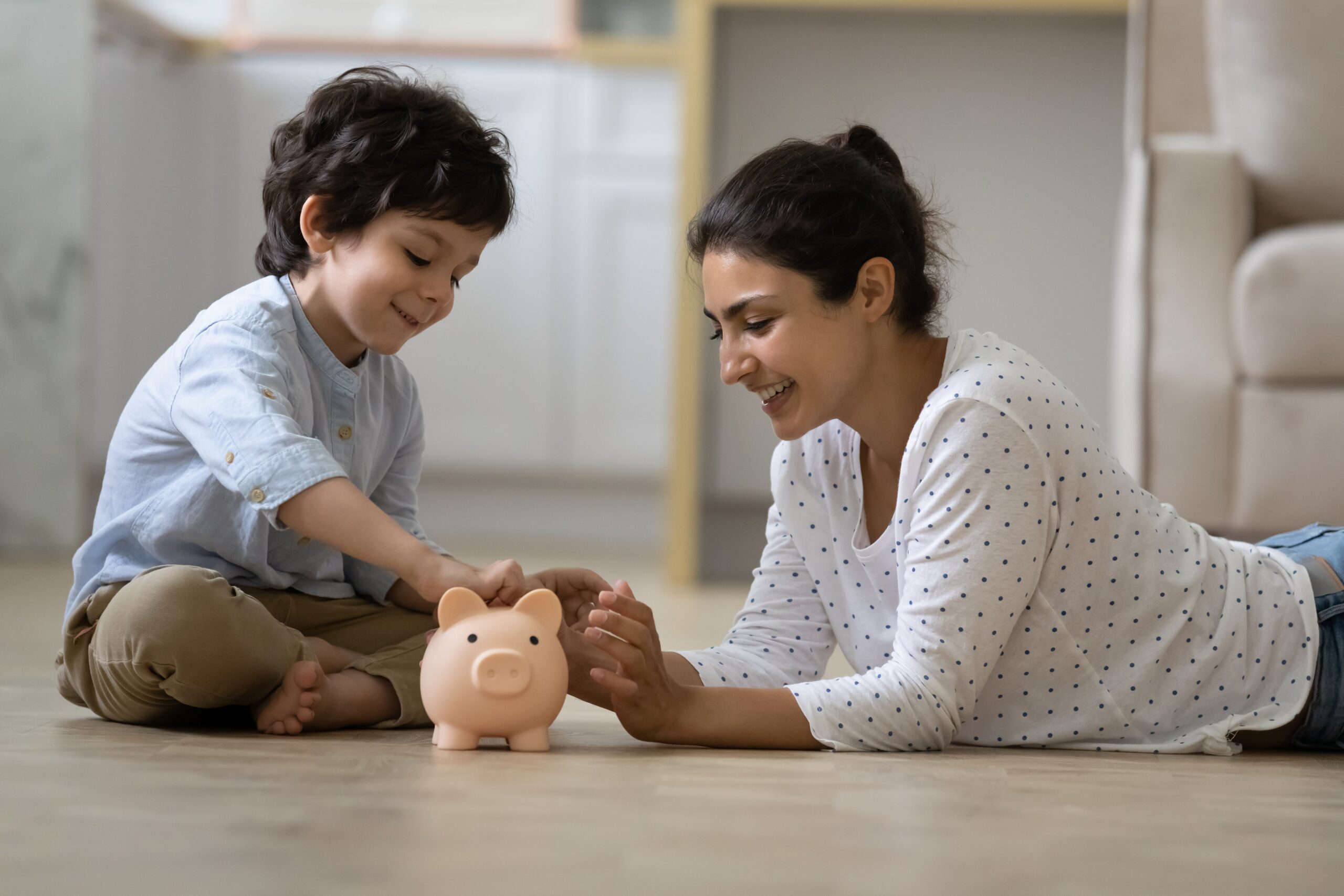 mom and son saving money